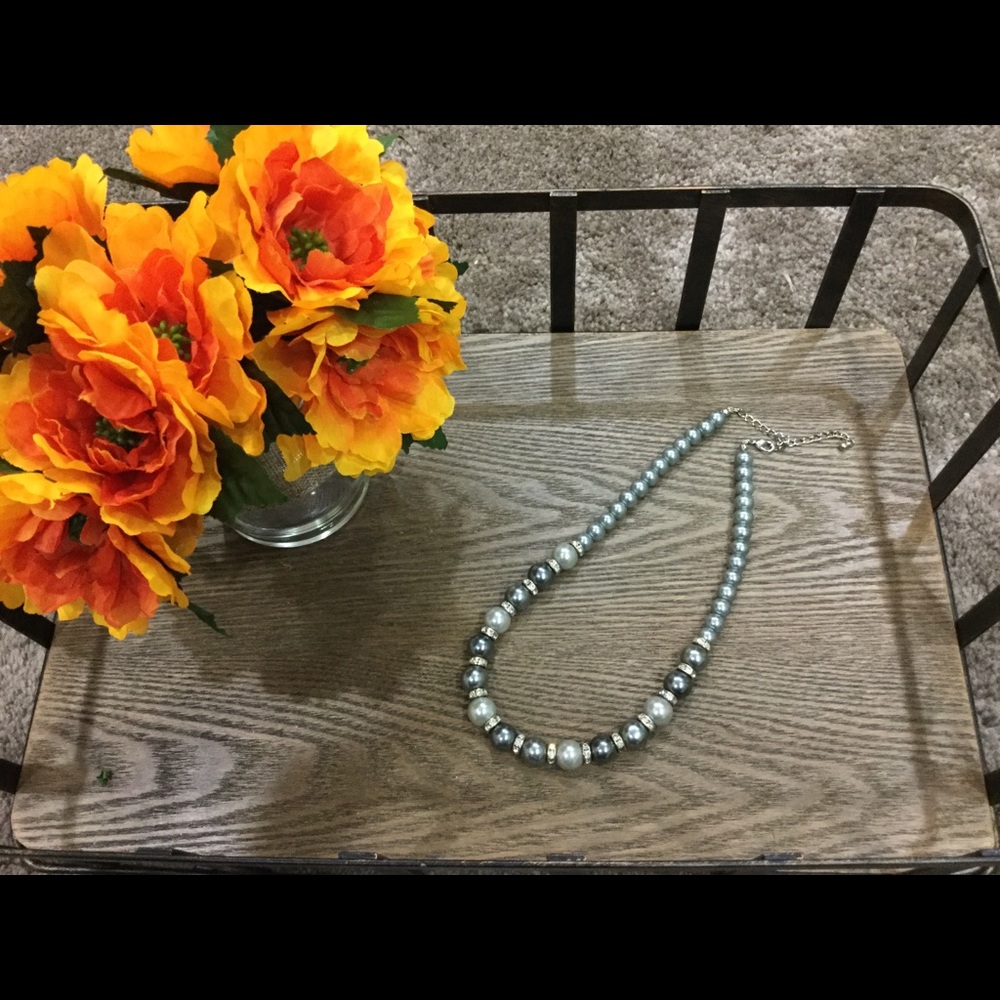 Beautiful strand faux pearls with cz accents.